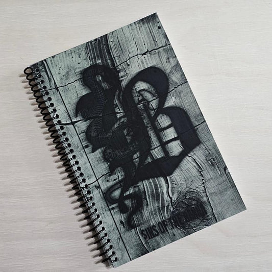 Merch: Sins of the Banna Lined Spiral Notebook